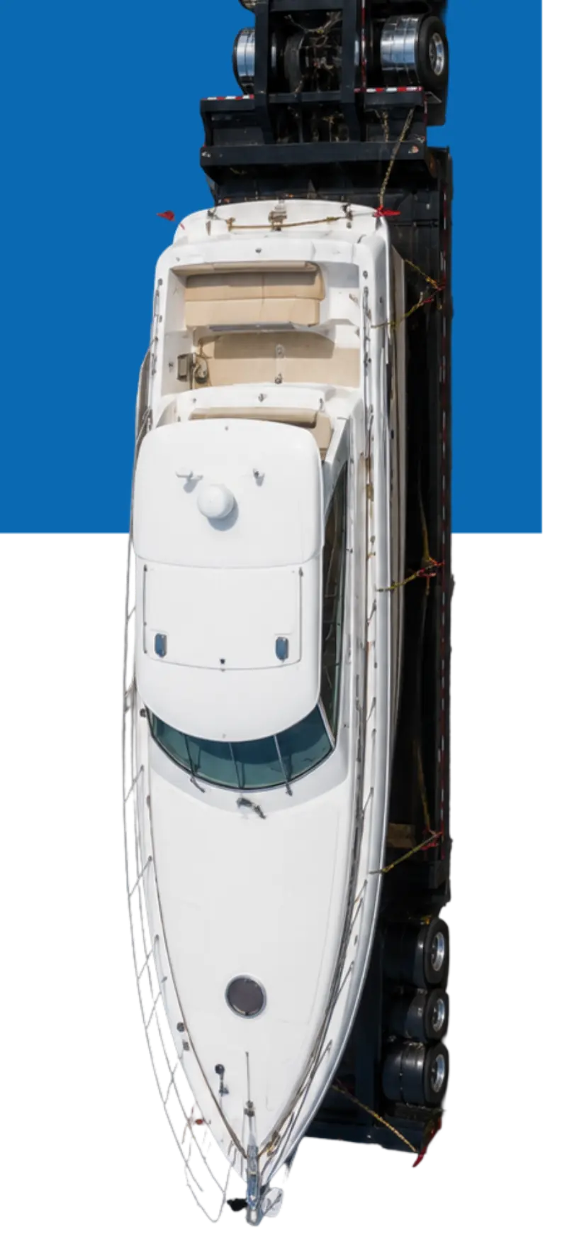 Overhead view of a white yacht cradled in a boat lift